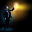 Businessman with light shining