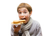 Photo: Portrait of a cute boy eating a waffle - isolated on white Portrait of a cute boy eating a waffle - isolated on white