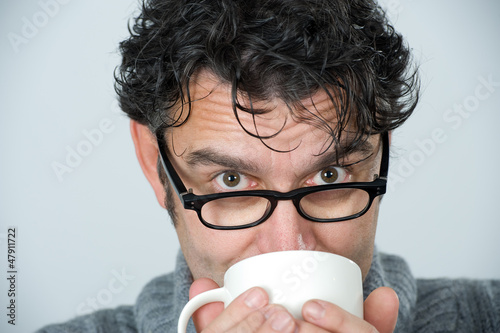 Photo: man is drinking man is drinking