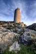 Outlined on a hilltop are the ruins of the Castle of Xiquena