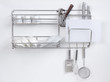 Photo: Stainless shelf with kitchen utensil on the white background Stainless shelf with kitchen utensil on the white background