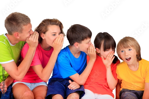 Photo: Happy children whispering Happy children whispering