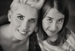 Blonde mother enjoying daughter's company
