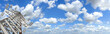 Power Tower. Blue sky and clouds for background. Panorama