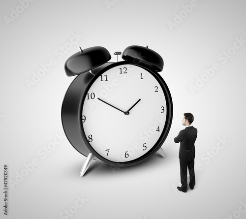 Photo: man and clock man and clock