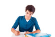 Young happy student carrying books