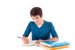 Young happy student carrying books