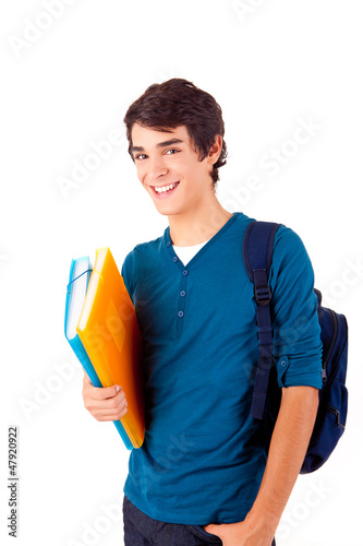 Photo: Young happy student carrying books Young happy student carrying books