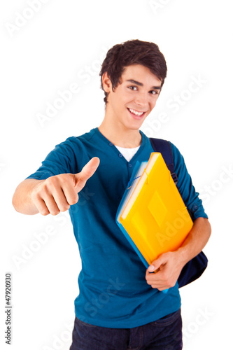 Photo: Young happy student showing thumbs up Young happy student showing thumbs up
