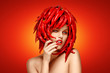 Photo: Masquerade. Woman with Creative Hairdo - Red Chili Pepper Masquerade. Woman with Creative Hairdo - Red Chili Pepper