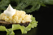 Capelin's  caviar on the black background