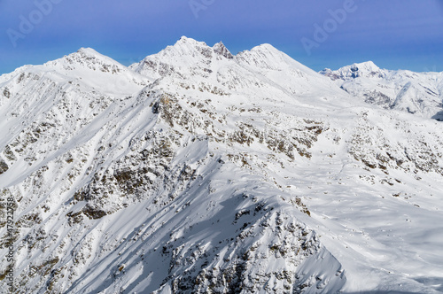 Photo: alps mountain covered with snow in winter, italy alps mountain covered with snow in winter, italy
