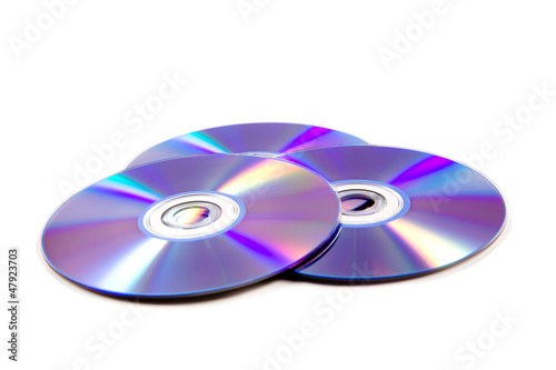 Photo: stack of cd roms. CD & DVD disk on white background stack of cd roms. CD & DVD disk on white background