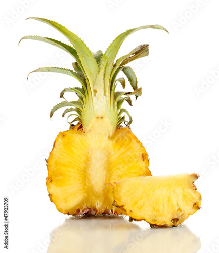 Photo: Sliced ripe pineapple isolated on white Sliced ripe pineapple isolated on white