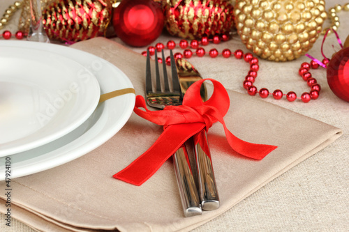 Photo: Serving Christmas table close-up Serving Christmas table close-up