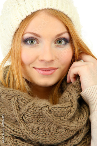 Photo: Young beautiful woman wearing winter clothing, isolated on Young beautiful woman wearing winter clothing, isolated on