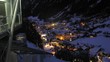 Carriages of funicular go up and down over valley which all is
