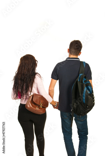 Photo: Back of students couple going school Back of students couple going school