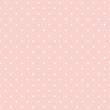 Polka dots on baby pink background seamless vector pattern