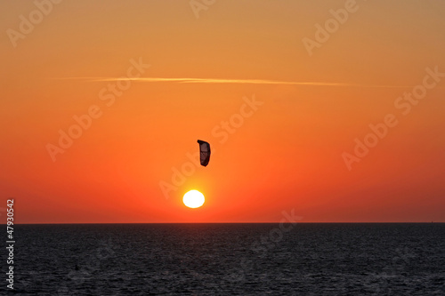 Photo: kitesufer at sunset kitesufer at sunset