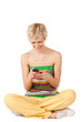 Photo: Smiling woman sending sms from a mobile phone Smiling woman sending sms from a mobile phone