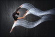 Young woman in gymnast suit posing