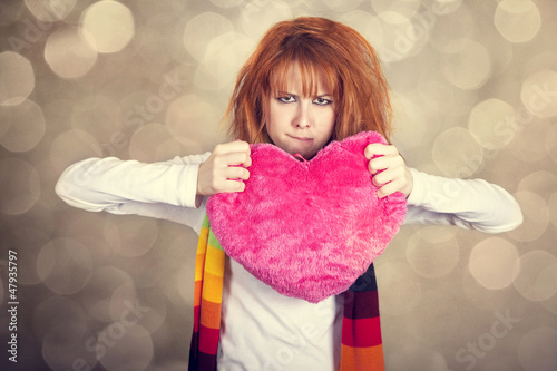 Photo: Sad girl with heart. St. Valentine Day Sad girl with heart. St. Valentine Day