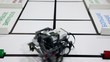 Video: Small robot moves and take green cub Small robot moves and take green cub