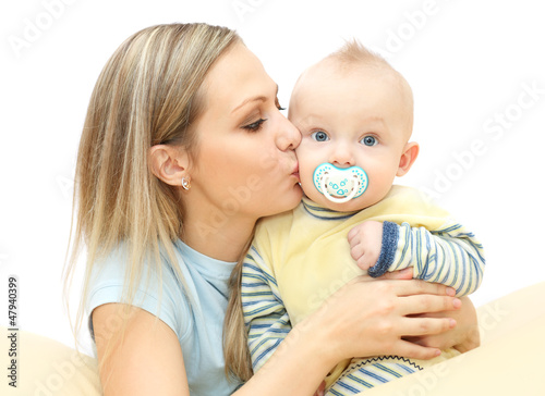 Photo: Young mother hugging baby Young mother hugging baby