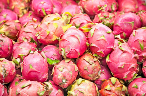 Photo: Dragon fruit on market stand on Java Dragon fruit on market stand on Java