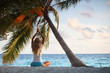 yoga woman under palm