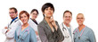 Young Mixed Race Woman with Doctors and Nurses Behind