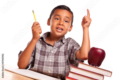 Photo: Hispanic Boy Raising His Hand, Books, Apple, Pencil and Paper Hispanic Boy Raising His Hand, Books, Apple, Pencil and Paper