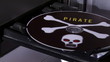 Pirated disc in player, in and out