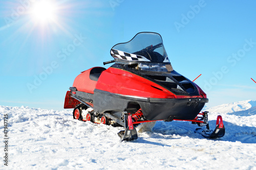 Photo: snow mobile ski sun sky blue red mountain snow mobile ski sun sky blue red mountain