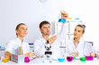 Team of scientists working in laboratory