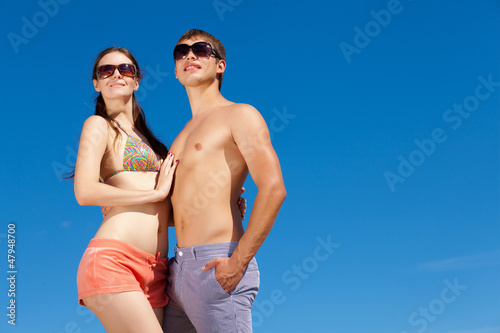 Photo: Happy Young Couple Together On The Beach Happy Young Couple Together On The Beach