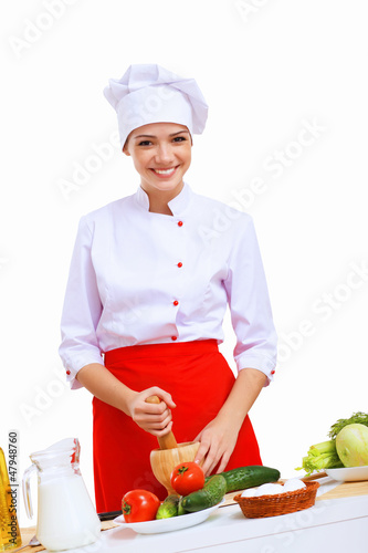 Photo: Young cook preparing food Young cook preparing food