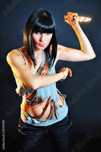Photo: The girl with a knife in blood The girl with a knife in blood
