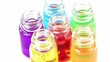 Six transparent open bottles spins with color oil