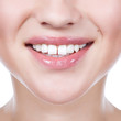 Foto: Healthy woman teeth and smile. Close up. Healthy woman teeth and smile. Close up.