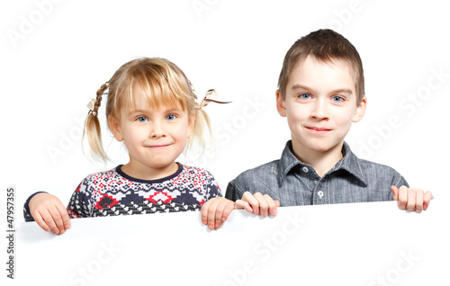Photo: Children holding banner Children holding banner