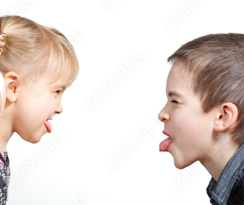 Photo: Children sticking out tongues Children sticking out tongues