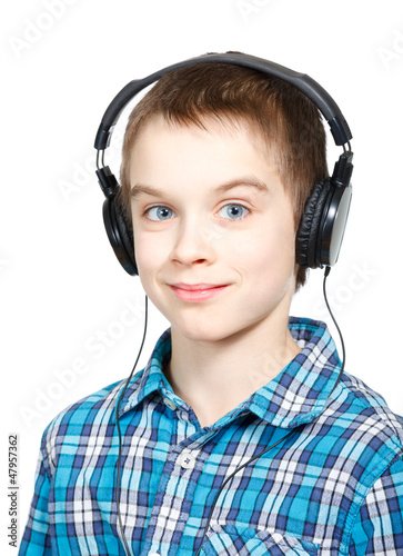 Photo: Kid wearing headphones Kid wearing headphones