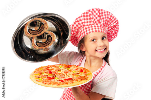 Photo: Young girl preparing homemade pizza Young girl preparing homemade pizza
