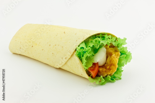 Photo: chicken strips wrapped in a tortilla chicken strips wrapped in a tortilla