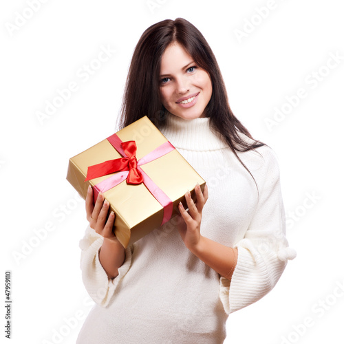 Photo: Happy woman holding gift box, isolated on white background Happy woman holding gift box, isolated on white background