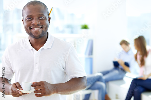 Photo: Man with cup Man with cup