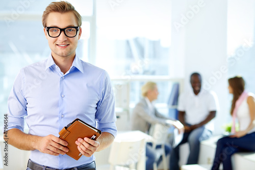 Photo: Man with notepad Man with notepad