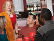 Woman Talking with Friends in Cafe